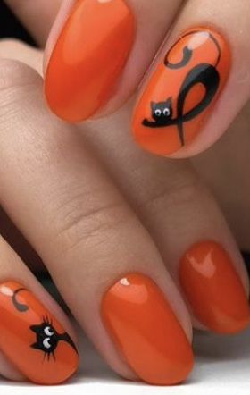 Unhas decoradas para festa de halloween.